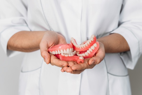 What Your Dentist Wants You To Know About Adjusting To New Dentures