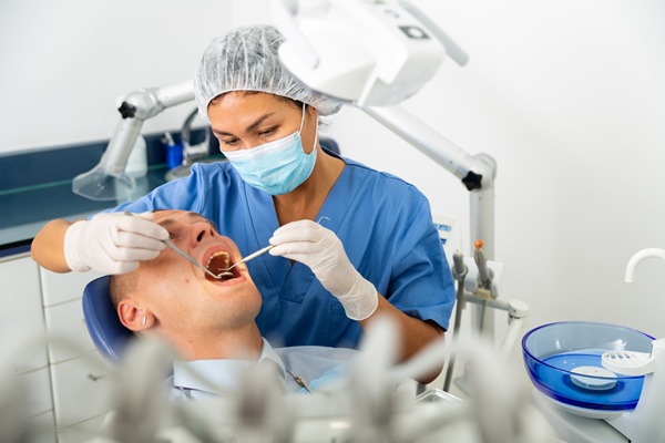 Dental Implant Restorations For Worn Or Loose Teeth: Treatment Pathways